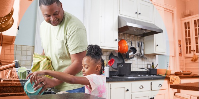 Dad and daughter in kitchen