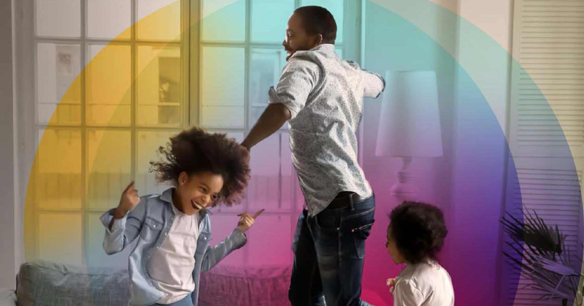 family dancing in living room